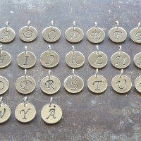 Familiesmykke bokstavsmykke